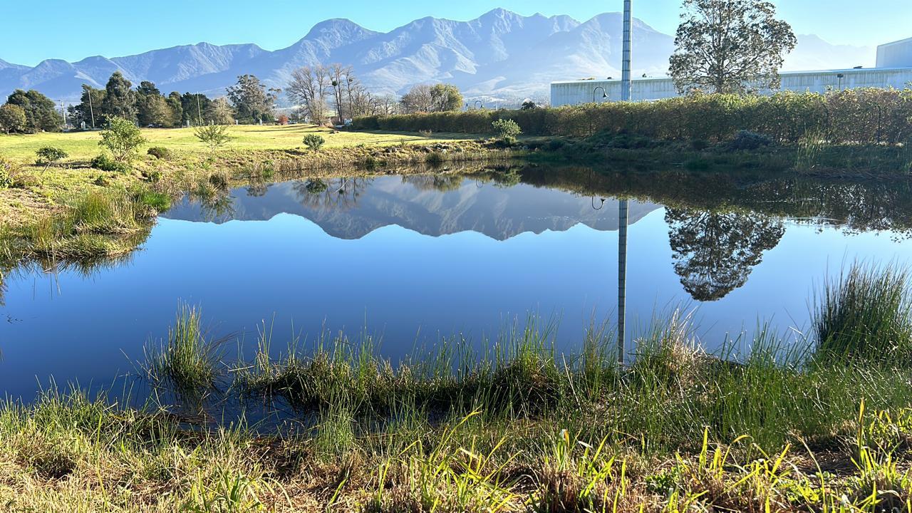 Stunning lake with mountain reflections near the school